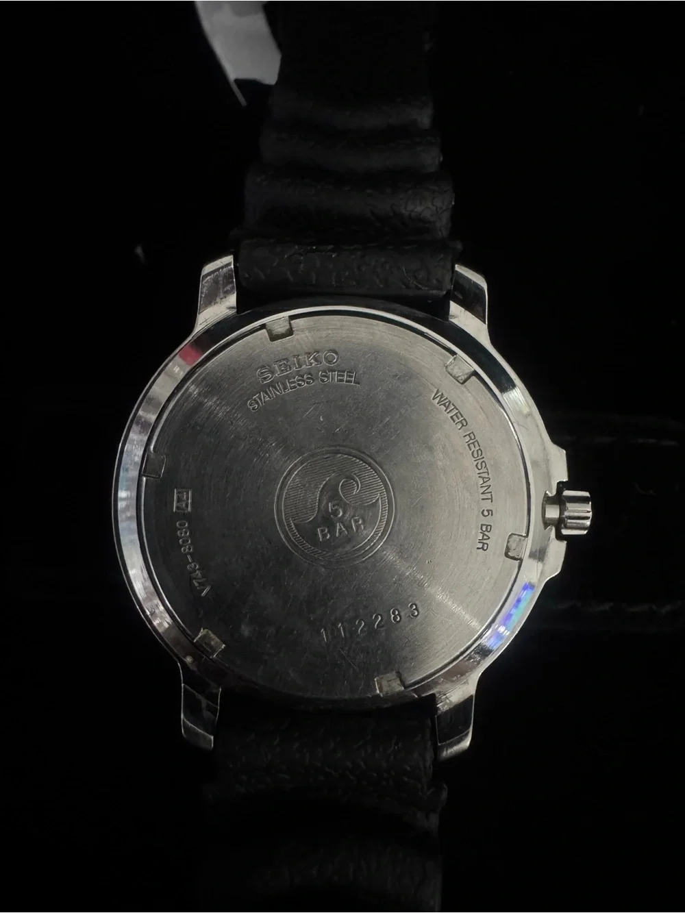 Seiko Black Dial Watch with Silver Bezel